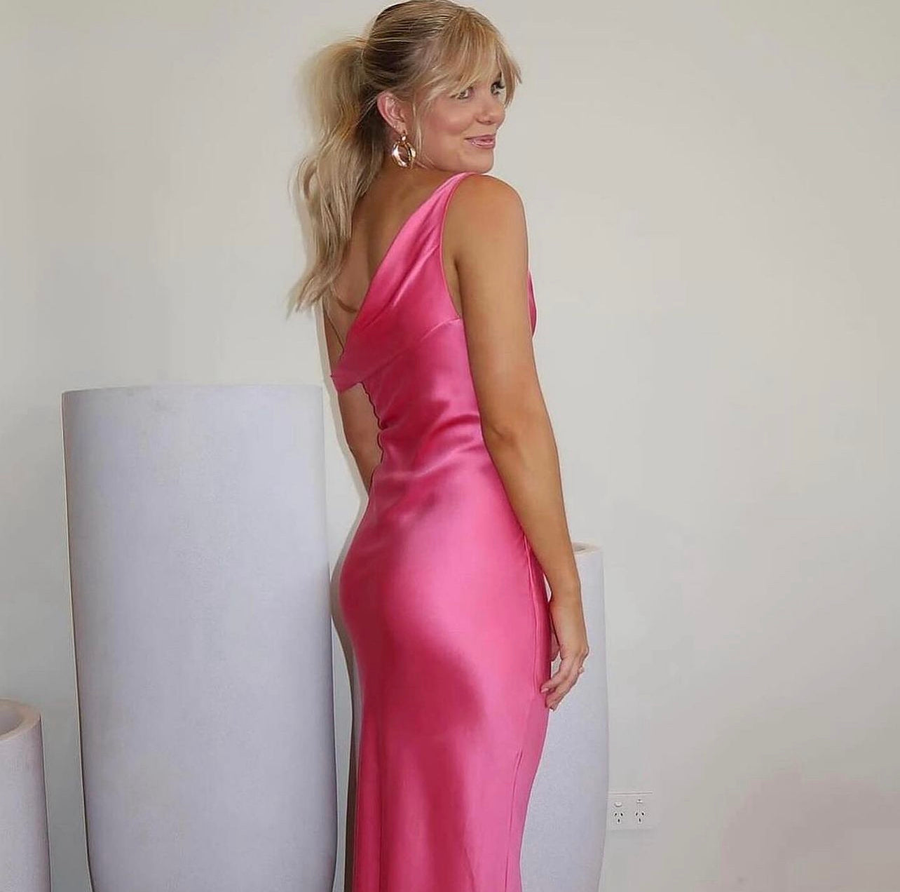 Natalie Rolt ‘Monika’ fuchsia satin gown