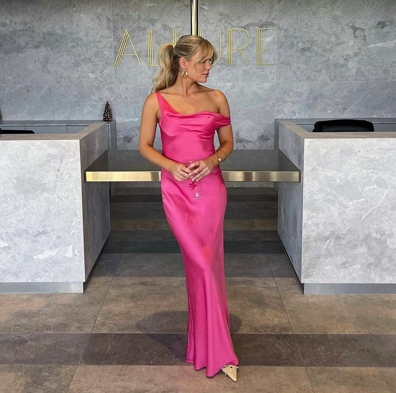 Natalie Rolt ‘Monika’ fuchsia satin gown